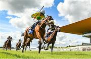 27 June 2021; Effernock Fizz, with Niall McCullagh up, on their way to winning the Irish Stallion Farms EBF 'Ragusa' Handicap during day three of the Dubai Duty Free Irish Derby Festival at The Curragh Racecourse in Kildare. Photo by Seb Daly/Sportsfile
