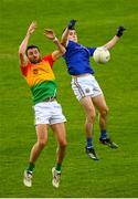 27 June 2021; Iarla O'Sullivan of Longford in action against Chris Blake of Carlow during the Leinster GAA Football Senior Championship Round 1 match between Carlow and Longford at Bord Na Mona O’Connor Park in Tullamore, Offaly. Photo by Eóin Noonan/Sportsfile