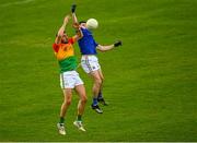 27 June 2021; Iarla O'Sullivan of Longford in action against Chris Blake of Carlow during the Leinster GAA Football Senior Championship Round 1 match between Carlow and Longford at Bord Na Mona O’Connor Park in Tullamore, Offaly. Photo by Eóin Noonan/Sportsfile