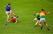 27 June 2021; Michael Quinn of Longford has a shot on goal saved by Ciaran Cunningham of Carlow during the Leinster GAA Football Senior Championship Round 1 match between Carlow and Longford at Bord Na Mona O’Connor Park in Tullamore, Offaly. Photo by Eóin Noonan/Sportsfile