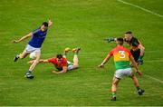 27 June 2021; Michael Quinn of Longford has a shot on goal which is saved by Ciaran Cunningham of Carlow during the Leinster GAA Football Senior Championship Round 1 match between Carlow and Longford at Bord Na Mona O’Connor Park in Tullamore, Offaly. Photo by Eóin Noonan/Sportsfile