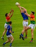 27 June 2021; Colm Hulton of Carlow in action against Eoghan Ruth of Carlow during the Leinster GAA Football Senior Championship Round 1 match between Carlow and Longford at Bord Na Mona O’Connor Park in Tullamore, Offaly. Photo by Eóin Noonan/Sportsfile