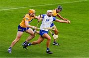 27 June 2021; Neil Montgomery of Waterford is tackled by Clare players David Fitzgerald, left, and Cathal Malone late in the Munster GAA Hurling Senior Championship Quarter-Final match between Waterford and Clare at Semple Stadium in Thurles, Tipperary. Photo by Ray McManus/Sportsfile