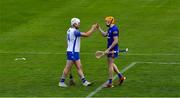 27 June 2021; Clare goalkeeper Eibhear Quilligan and Shane Bennett of Waterford after the Munster GAA Hurling Senior Championship Quarter-Final match between Waterford and Clare at Semple Stadium in Thurles, Tipperary. Photo by Ray McManus/Sportsfile