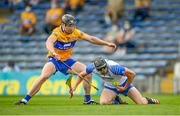 27 June 2021; Conor Gleeson of Waterford and Tony Kelly of Clare during the Munster GAA Hurling Senior Championship Quarter-Final match between Waterford and Clare at Semple Stadium in Thurles, Tipperary. Photo by Stephen McCarthy/Sportsfile