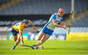 27 June 2021; Calum Lyons of Waterford in action against Ian Galvin of Clare during the Munster GAA Hurling Senior Championship Quarter-Final match between Waterford and Clare at Semple Stadium in Thurles, Tipperary. Photo by Stephen McCarthy/Sportsfile