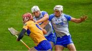 27 June 2021; John Conlon of Clare in action against Dessie Hutchinson, right, and Neil Montgomery  of Waterford during the Munster GAA Hurling Senior Championship Quarter-Final match between Waterford and Clare at Semple Stadium in Thurles, Tipperary. Photo by Ray McManus/Sportsfile