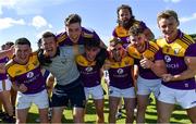 27 June 2021; Wexford selector Anthony Masterson celebrates with Wexford players after their victory in the Leinster GAA Football Senior Championship Round 1 match between Wicklow and Wexford at County Grounds in Aughrim, Wicklow. Photo by Piaras Ó Mídheach/Sportsfile