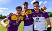 27 June 2021; Wexford players, from left, Padraic Hughes, Liam Coleman, and Darragh Brooks celebrate after the Leinster GAA Football Senior Championship Round 1 match between Wicklow and Wexford at County Grounds in Aughrim, Wicklow. Photo by Piaras Ó Mídheach/Sportsfile