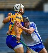 27 June 2021; Aron Shanagher of Clare is tackled by Iarlaith Daly of Waterford during the Munster GAA Hurling Senior Championship Quarter-Final match between Waterford and Clare at Semple Stadium in Thurles, Tipperary. Photo by Ray McManus/Sportsfile