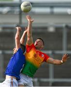 27 June 2021; Darragh Foley of Carlow in action against Andrew Farrell of Longford during the Leinster GAA Football Senior Championship Round 1 match between Carlow and Longford at Bord Na Mona O’Connor Park in Tullamore, Offaly. Photo by Eóin Noonan/Sportsfile