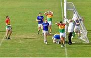 27 June 2021; Carlow players react after Longford goalkeeper Paddy Collum saves an attempt on goal by Chris Blake of Carlow late in the game during the Leinster GAA Football Senior Championship Round 1 match between Carlow and Longford at Bord Na Mona O’Connor Park in Tullamore, Offaly. Photo by Eóin Noonan/Sportsfile