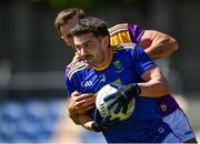 27 June 2021; Oisín Manning of Wicklow in action against Brian Malone of Wexford during the Leinster GAA Football Senior Championship Round 1 match between Wicklow and Wexford at County Grounds in Aughrim, Wicklow. Photo by Piaras Ó Mídheach/Sportsfile