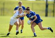 27 June 2021; Erone Fitzpatrick of Laois in action against Lauren Murtagh of Kildare during the Lidl Ladies Football National League Division 3 Final match between Kildare and Laois at Baltinglass GAA Club in Baltinglass, Wicklow. Photo by Matt Browne/Sportsfile