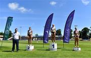 27 June 2021; Athletics Ireland Chair of Competition Andrew Lynam, left, with Women's 100m medallists, from left, Kate Doherty, Dundrum South Dublin AC, silver, Sarah Lavin of Emerald AC, Limerick, gold, and Lilly-Ann O'Hora of Dooneen AC, Limerick, bronze, during day three of the Irish Life Health National Senior Championships at Morton Stadium in Santry, Dublin. Photo by Sam Barnes/Sportsfile