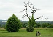 29 June 2021; Søren Kjeldsen of Denmark walks along the 18th fairway with his caddy during a practice round before the Dubai Duty Free Irish Open Golf Championship at Mount Juliet in Thomastown, Kilkenny. Photo by Ramsey Cardy/Sportsfile