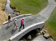 29 June 2021; Irish golfers, from left, Robin Dawson, Paul Dunne and Padraig Harrington walk onto the third green during a practice round before the Dubai Duty Free Irish Open Golf Championship at Mount Juliet in Thomastown, Kilkenny. Photo by Ramsey Cardy/Sportsfile