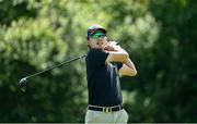 29 June 2021; Min Woo Lee of Australia watches his tee shot on the 5th during a practice round before the Dubai Duty Free Irish Open Golf Championship at Mount Juliet in Thomastown, Kilkenny.  Photo by Ramsey Cardy/Sportsfile