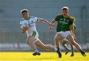 30 June 2021; Harry Plunkett of Offaly in action against Conor Gray of Meath during the Electric Ireland Leinster GAA Football Minor Championship Final match between Meath and Offaly at TEG Cusack Park in Mullingar, Westmeath. Photo by Matt Browne/Sportsfile