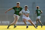 30 June 2021; Harry Plunkett of Offaly in action against Conor Gray of Meath during the Electric Ireland Leinster GAA Football Minor Championship Final match between Meath and Offaly at TEG Cusack Park in Mullingar, Westmeath. Photo by Matt Browne/Sportsfile
