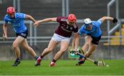 23 June 2021; Diarmuid Kilcommins of Galway in action against Liam Murphy, right, and Kevin Desmond of Dublin during the 2020 Bord Gáis Energy Leinster Under 20 Hurling Championship Final match between Dublin and Galway at Bord na Móna O'Connor Park in Tullamore, Offaly. Photo by Piaras Ó Mídheach/Sportsfile
