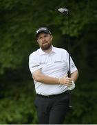 1 July 2021; Shane Lowry of Ireland watches his drive from the 12th tee box during day one of the Dubai Duty Free Irish Open Golf Championship at Mount Juliet Golf Club in Thomastown, Kilkenny. Photo by Ramsey Cardy/Sportsfile