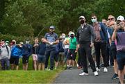 1 July 2021; Andy Sullivan of England watches his shot on the 15th with spectators wearing masks during day one of the Dubai Duty Free Irish Open Golf Championship at Mount Juliet Golf Club in Thomastown, Kilkenny. Photo by Ramsey Cardy/Sportsfile