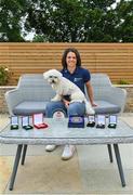 1 July 2021; Noelle Healy pictured at home with her dog Luna and some stand-out medals and awards from her career. Noelle was helping to launch the Bord Gáis Energy GAA Legends Tour Series for 2021. The tours start online on Wednesday, 7 July continuing weekly for eight weeks, and can be viewed on Bord Gáis Energy Rewards page - bordgaisenergy.ie/my-rewards. Photo by Brendan Moran/Sportsfile