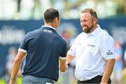 1 July 2021; Shane Lowry of Ireland and Martin Kaymer of Germany exchange a handshake after their round during day one of the Dubai Duty Free Irish Open Golf Championship at Mount Juliet Golf Club in Thomastown, Kilkenny. Photo by Ramsey Cardy/Sportsfile