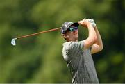 1 July 2021; John Catlin of USA watches his tee shot from the fourth tee box during day one of the Dubai Duty Free Irish Open Golf Championship at Mount Juliet Golf Club in Thomastown, Kilkenny. Photo by Ramsey Cardy/Sportsfile