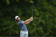 1 July 2021; Tommy Fleetwood of England watches his second shot on the first hole during day one of the Dubai Duty Free Irish Open Golf Championship at Mount Juliet Golf Club in Thomastown, Kilkenny. Photo by Ramsey Cardy/Sportsfile