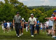 1 July 2021; John Catlin of USA, left, and Rory McIlroy of Northern Ireland make their way to eighth green during day one of the Dubai Duty Free Irish Open Golf Championship at Mount Juliet Golf Club in Thomastown, Kilkenny. Photo by Ramsey Cardy/Sportsfile