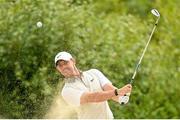 1 July 2021; Rory McIlroy of Northern Ireland plays a shot out of the bunker on to the 18th green during day one of the Dubai Duty Free Irish Open Golf Championship at Mount Juliet Golf Club in Thomastown, Kilkenny. Photo by Ramsey Cardy/Sportsfile