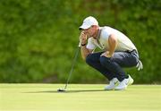 1 July 2021; Rory McIlroy of Northern Ireland lines up a putt on the 17th green during day one of the Dubai Duty Free Irish Open Golf Championship at Mount Juliet Golf Club in Thomastown, Kilkenny. Photo by Ramsey Cardy/Sportsfile