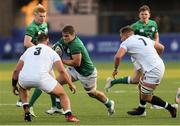 1 July 2021; Alex Kendellen of Ireland takes on Jack Clement, right, and Harvey Kindell-Beaton of England during the U20 Guinness Six Nations Rugby Championship match between Ireland and England at Cardiff Arms Park in Cardiff, Wales. Photo by Gareth Everett/Sportsfile