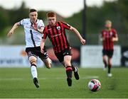 18 June 2021; Aodh Dervin of Longford Town in action against Daniel Kelly of Dundalk during the SSE Airtricity League Premier Division match between Dundalk and Longford Town at Oriel Park in Dundalk, Louth. Photo by Eóin Noonan/Sportsfile