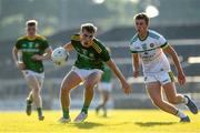 30 June 2021; Ruairi Kinsella of Meath in action against Pauric Robbins of Offaly during the Electric Ireland Leinster GAA Football Minor Championship Final match between Meath and Offaly at TEG Cusack Park in Mullingar, Westmeath. Photo by Matt Browne/Sportsfile