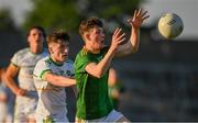 30 June 2021; Ruairi Kinsella of Meath in action against Tom Hylland of Offaly during the Electric Ireland Leinster GAA Football Minor Championship Final match between Meath and Offaly at TEG Cusack Park in Mullingar, Westmeath. Photo by Matt Browne/Sportsfile