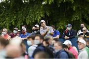 2 July 2021; Niall Kearney of Ireland watches his drive from the 10th tee box as spectators look on during day two of the Dubai Duty Free Irish Open Golf Championship at Mount Juliet Golf Club in Thomastown, Kilkenny. Photo by Ramsey Cardy/Sportsfile