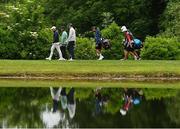 2 July 2021; Rory McIlroy of Northern Ireland, Tommy Fleetwood of England and John Catlin of USA make their way to the 11th green during day two of the Dubai Duty Free Irish Open Golf Championship at Mount Juliet Golf Club in Thomastown, Kilkenny. Photo by Ramsey Cardy/Sportsfile