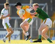 30 June 2021; Tomas Lynch of Offaly in action against Ruairi Kinsella of Meath during the Electric Ireland Leinster GAA Football Minor Championship Final match between Meath and Offaly at TEG Cusack Park in Mullingar, Westmeath. Photo by Matt Browne/Sportsfile