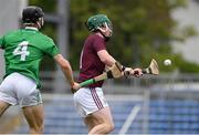 2 July 2021; Ruben Davitt of Galway scores the first goal despite the attention from Ronan Lyons of Limerick during the 2020 Electric Ireland Leinster GAA Hurling Minor Championship Semi-Final match between Limerick and Galway at Cusack Park in Ennis, Clare. Photo by Matt Browne/Sportsfile