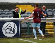 2 July 2021; Ian Turner of Cobh Ramblers celebrates with kitman Ken Hennessy after scoring his side's first goal during the SSE Airtricity League First Division match between Bray Wanderers and Cobh Ramblers at Carlisle Grounds in Bray, Wicklow. Photo by Harry Murphy/Sportsfile