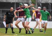 2 July 2021; Gavin Lee of Galway in action against Sean Whelan of Limerick during the 2020 Electric Ireland Leinster GAA Hurling Minor Championship Semi-Final match between Limerick and Galway at Cusack Park in Ennis, Clare. Photo by Matt Browne/Sportsfile