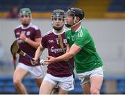 2 July 2021; Cian Scully of Limerick in action against Liam Collins of Galway during the 2020 Electric Ireland Leinster GAA Hurling Minor Championship Semi-Final match between Limerick and Galway at Cusack Park in Ennis, Clare. Photo by Matt Browne/Sportsfile