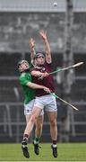 2 July 2021; Sean O'Hanlon of Galway in action against Patrick O'Donovan of Limerick during the 2020 Electric Ireland Leinster GAA Hurling Minor Championship Semi-Final match between Limerick and Galway at Cusack Park in Ennis, Clare. Photo by Matt Browne/Sportsfile