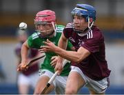 2 July 2021; Kieran Hanrahan of Galway in action against John Kirby of Limerick during the 2020 Electric Ireland Leinster GAA Hurling Minor Championship Semi-Final match between Limerick and Galway at Cusack Park in Ennis, Clare. Photo by Matt Browne/Sportsfile