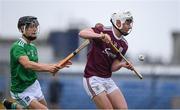 2 July 2021; Colm Molloy of Galway in action against Joseph Fitzgerald of Limerick during the 2020 Electric Ireland Leinster GAA Hurling Minor Championship Semi-Final match between Limerick and Galway at Cusack Park in Ennis, Clare. Photo by Matt Browne/Sportsfile