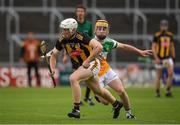 3 July 2021; Timmy Clifford of Kilkenny in action against Patrick Taffee of Offaly during the 2020 Electric Ireland Leinster GAA Hurling Minor Championship Final match between Offaly and Kilkenny at MW Hire O'Moore Park in Portlaoise, Laois. Photo by Matt Browne/Sportsfile