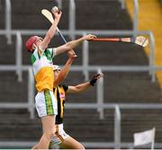 3 July 2021; Sam Bourke of Offaly in action against Ted Dunne of Kilkenny during the 2020 Electric Ireland Leinster GAA Hurling Minor Championship Final match between Offaly and Kilkenny at MW Hire O'Moore Park in Portlaoise, Laois. Photo by Matt Browne/Sportsfile